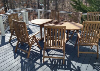 A wooden dining table with chairs